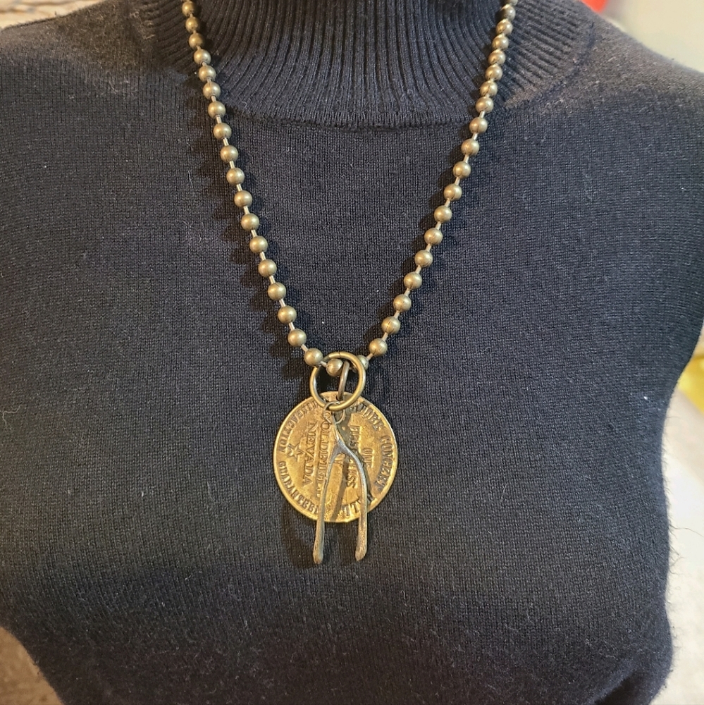Metal coin with wishbone neclace
